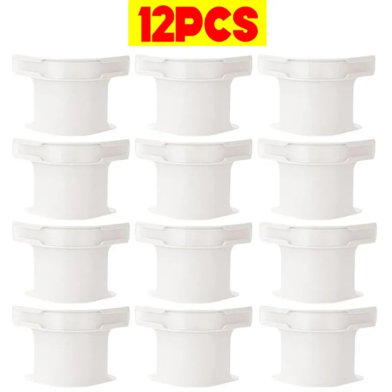 Twelve white non-slip sheet fixing clips or straps for securing bedding.