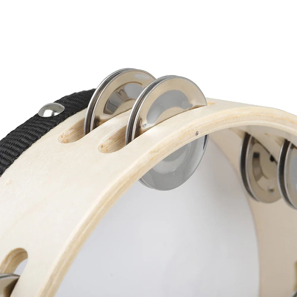 A close-up view of an 8-inch wooden tambourine with jingle bells, showing the wooden rim and metal jingles.