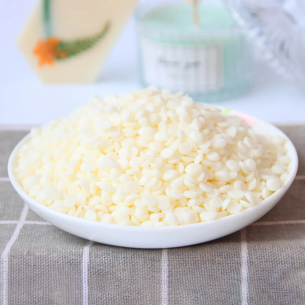 A bowl filled with white natural soy wax granules for DIY candle and skincare making.