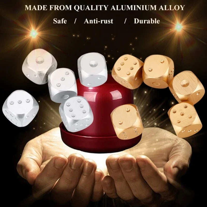 A hand holds a red storage box containing five metal aluminum alloy dice.