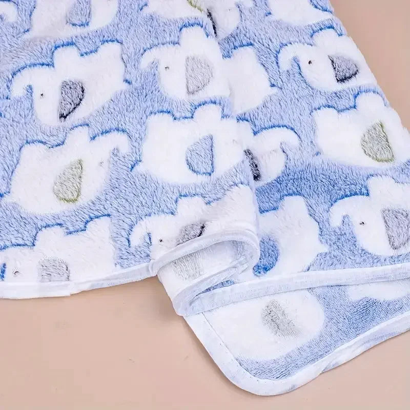A light blue and white flannel pet blanket with a cartoon elephant pattern for dogs and cats.