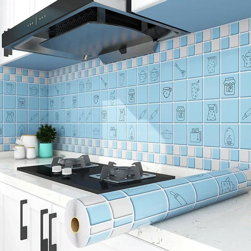 A kitchen splashback tiled with blue and white food-related icons, featuring a rolled-up blue and white adhesive mat.