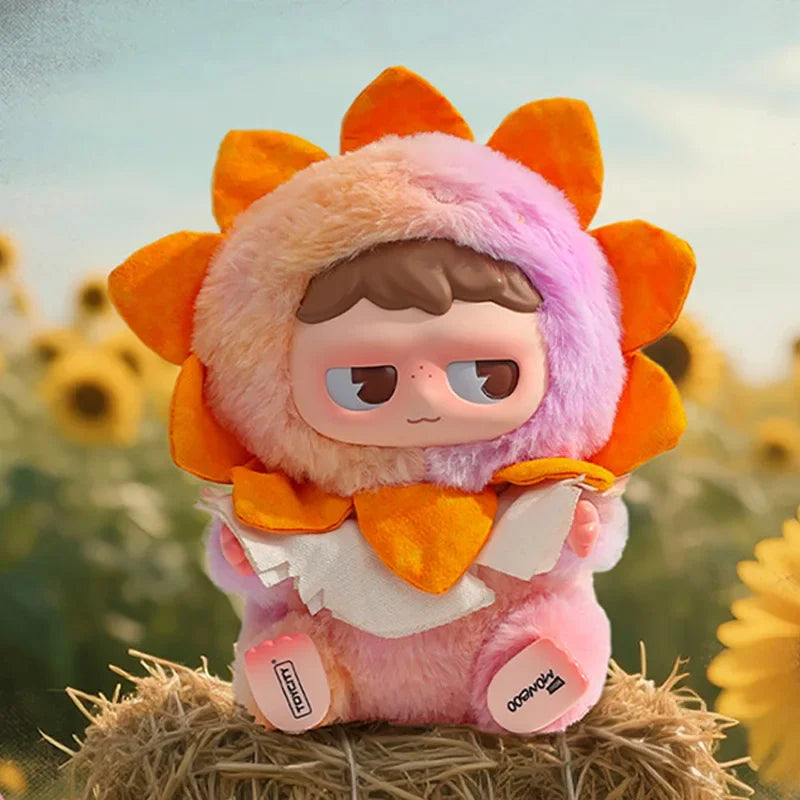 A pink and orange MONBOO Emotional Weather Station collectible blind box keychain with soft fur ears