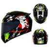 A black full face motorcycle helmet with a green and white graphic design shown from multiple angles.
