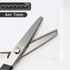 Stainless steel pinking shears with a 7mm arc shown on a white background.