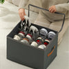 A person holds an open foldable shoe organizer with a dustproof lid filled with various sneakers and shoes.