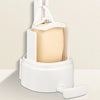 A white soap bar grinder and dispenser with a wall-mount option is shown on a light surface.