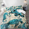 A sea turtle design printed on a duvet cover featuring shades of blue and teal.