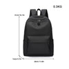 Black minimalist unisex canvas backpack shown from the front with dimensions listed.