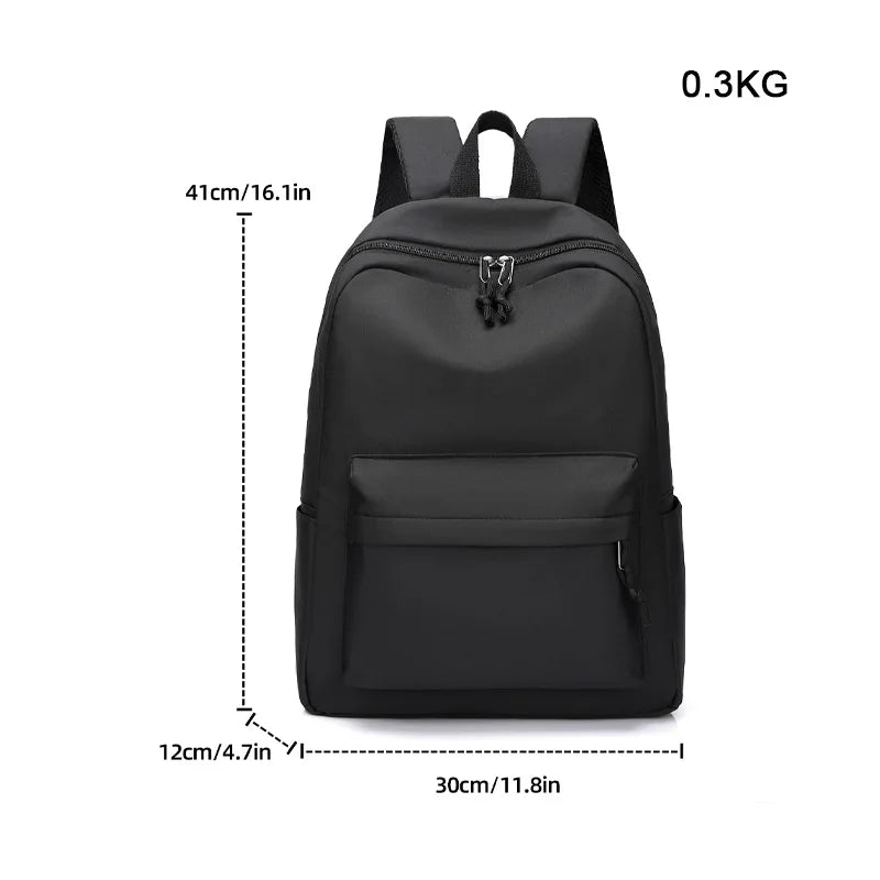 Black minimalist unisex canvas backpack shown from the front with dimensions listed.