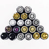 A set of ten 1:64 scale alloy car wheels and tires arranged in a pyramid formation.