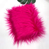 Vibrant magenta faux fur fabric used for DIY sewing, doll hair, and cosplay projects.