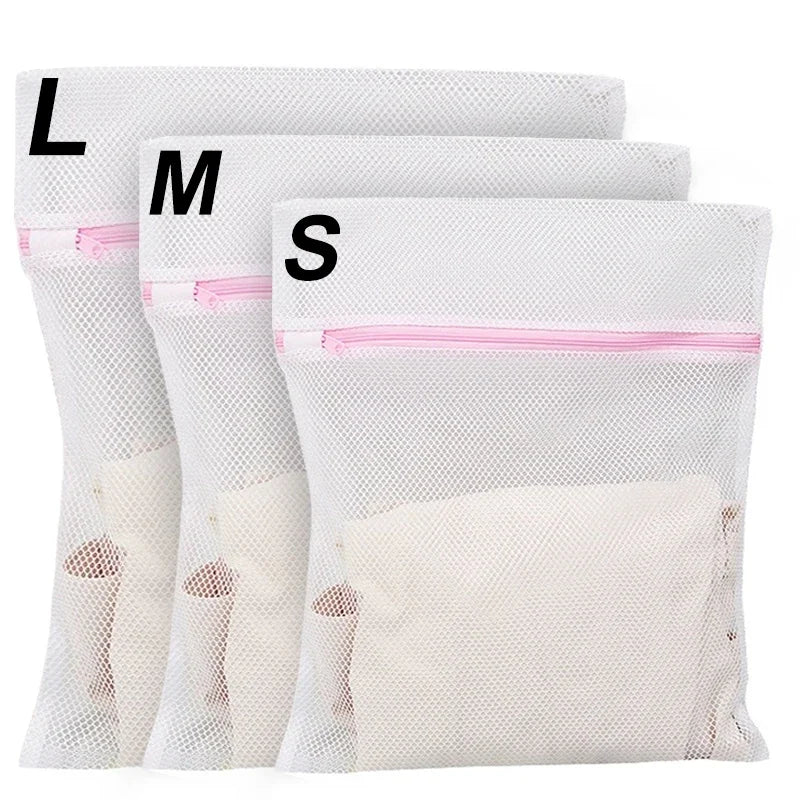 Three mesh laundry bags labeled L, M, and S for delicate clothing care