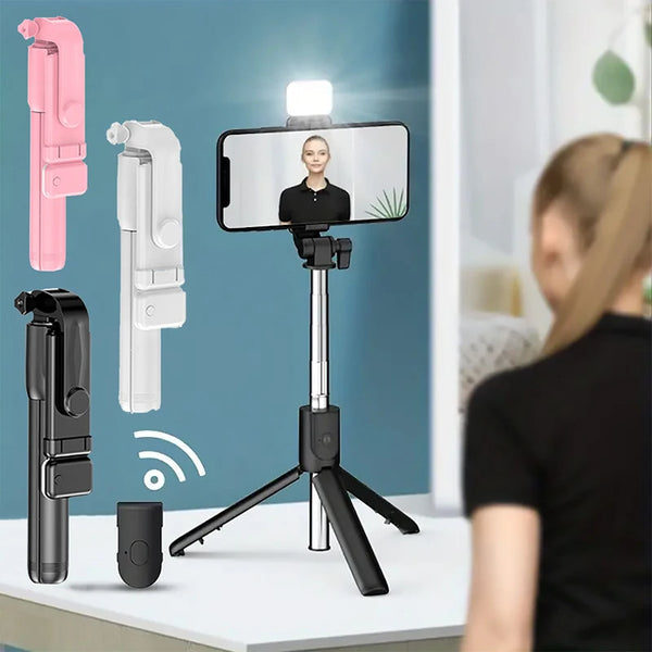 A portable Bluetooth selfie stick tripod with a fill light is shown next to a smartphone and a person.
