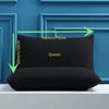A black Queen size pillowcase is displayed against a blue wooden frame, showing its dimensions.