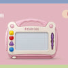 A pink magnetic drawing board for kids with a clear surface and an eraser pen.