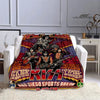 A flannel throw blanket featuring a graphic design of the Kiss band and text related to Diego Sports Arena.