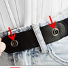Two black elastic straps used as belts or accessories for clothing