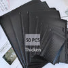 A stack of 50 black opaque bubble mailers with self-sealing adhesive.