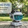 A white 360° rotating bubble machine sits on a wooden surface outdoors.