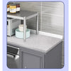 A kitchen cabinet featuring a self-adhesive oil-proof sticker on the door, with jars and bowls displayed on the countertop.