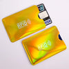 A yellow RFID protection card sleeve is shown next to a black credit card, demonstrating its use for security.