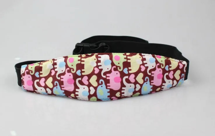 Pink and yellow elephant patterned adjustable baby car seat sleeping headrest with a black belt strap