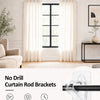 No Drill Curtain Rod Brackets shown with a window and sheer curtains in a bright room.