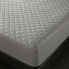A close-up view of a gray quilted waterproof mattress protector with deep pockets.