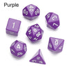 A set of purple polyhedral dice including a d6, d8, d10, d12, d20, and a triangular die.