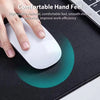 A hand is using a white computer mouse on a dark mouse pad, with a laptop keyboard visible in the background.