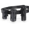 Black tactical duty belt holder with three rotating holders for securing gear.
