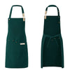 Dark green waterproof canvas chef apron with wooden toggles