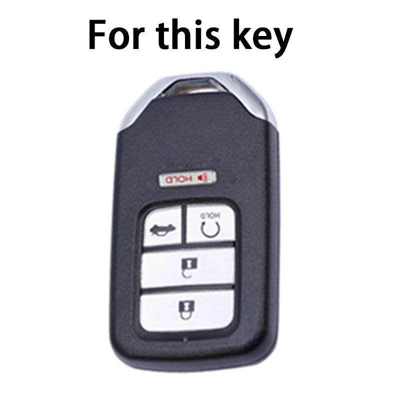 A black and silver TPU protective key case for a vehicle key.