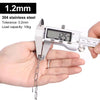 A hand holds a silver stainless steel chain and a digital caliper measuring its thickness.