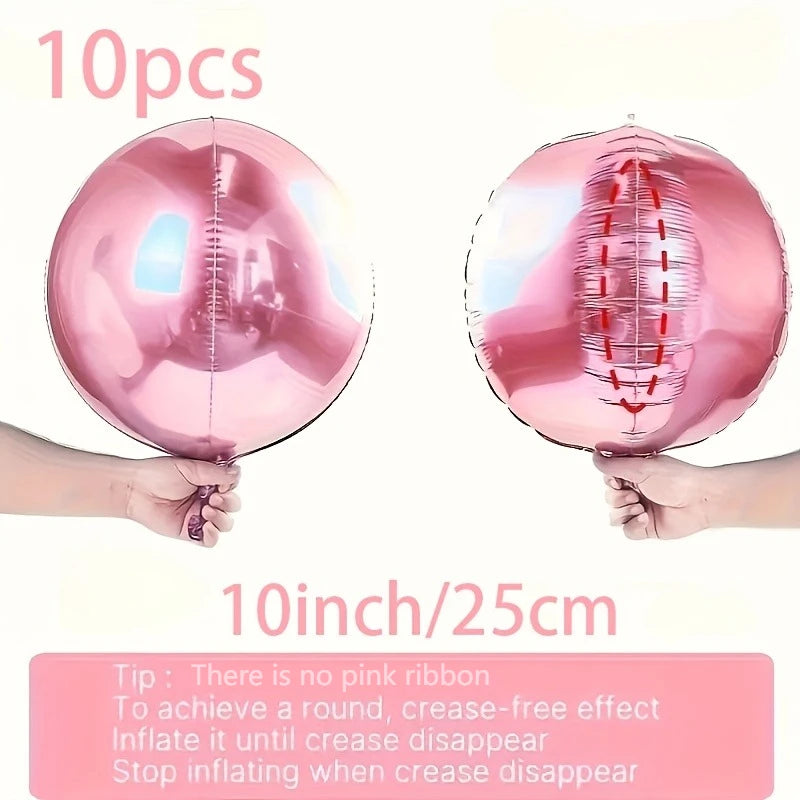 A set of ten metallic pink round foil balloons being held by hands, demonstrating the crinkle-free inflation effect.