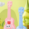 Pink and blue miniature ukulele toy guitars featuring cute cat and deer designs