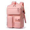 A pink travel backpack with multiple compartments and a laptop sleeve.