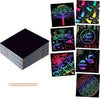 A set of colorful scratch art paper sheets and a wooden stylus for creating designs.