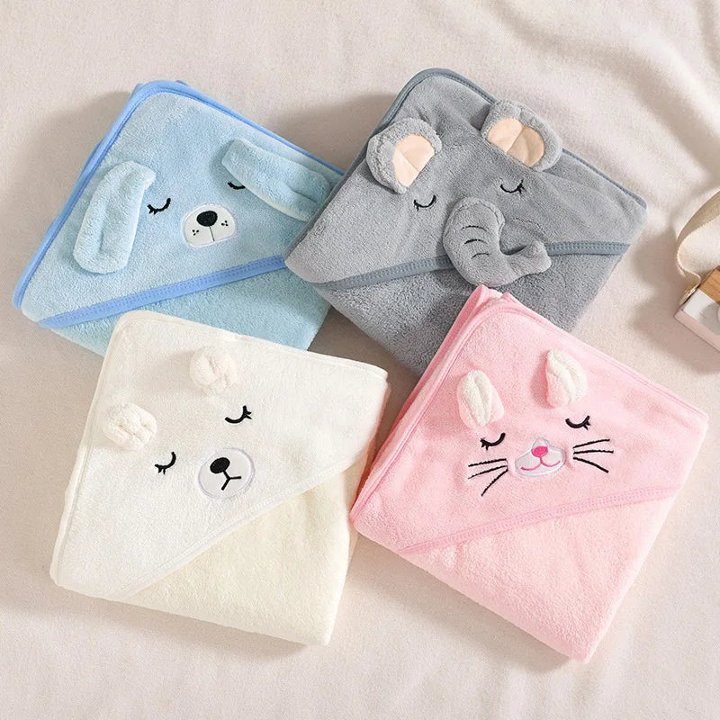Three soft hooded baby bathrobes featuring cartoon animals: a blue elephant, a gray elephant, and a pink cat.