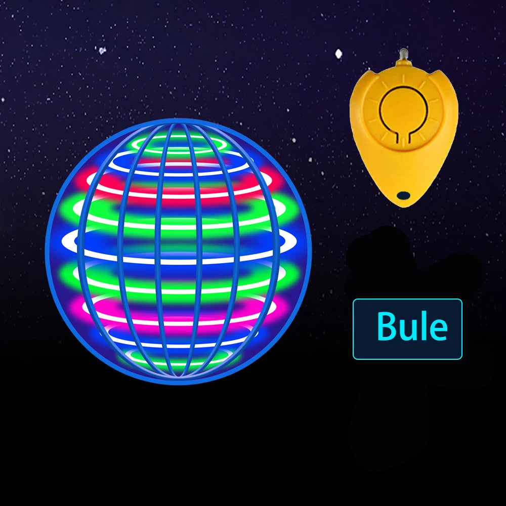 A yellow remote control for a flying spinner toy with LED lights against a dark, starry background.