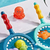 An Animal Salvage water toy set featuring a turtle and an orange fish floating in blue water.