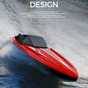 A red speedboat cutting through the water, showcasing fluid contour design.