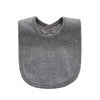 A soft gray cotton baby bib with a rounded shape and a small collar.