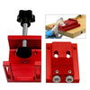 Red adjustable pocket hole jig kit for woodworking showing the jig and a clamp tool
