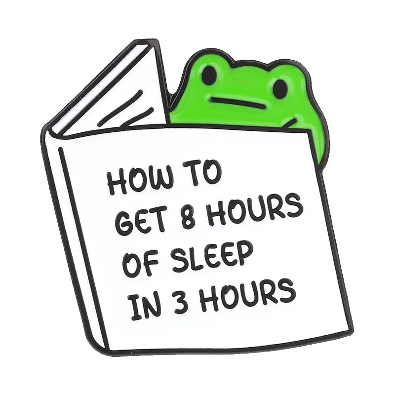 An enamel pin featuring a green frog on the cover of a book titled How to Get 8 Hours of Sleep in 3 Hours