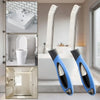 A pair of hard bristle crevice cleaning brushes with non-slip handles shown alongside bathroom fixtures.