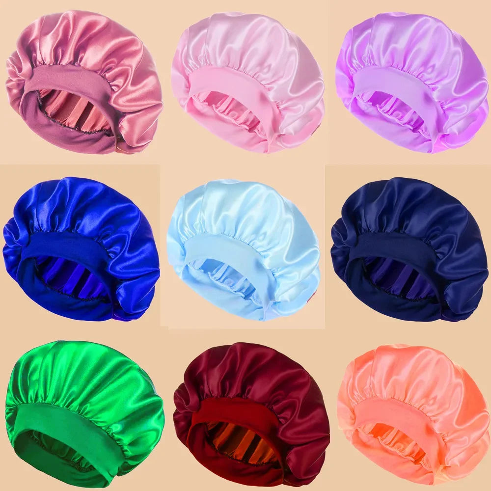 A collection of various satin wide brim shower caps in shades of pink, purple, blue, and green.