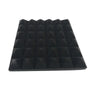 A rectangular panel of black pyramid acoustic foam panels.