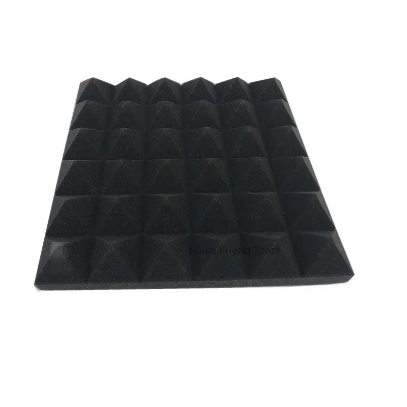 A rectangular panel of black pyramid acoustic foam panels.